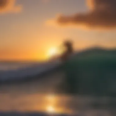 Sunset silhouette of a surfer on a pristine beach in Turks and Caicos