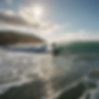 Surfers catching waves at Dillon Beach