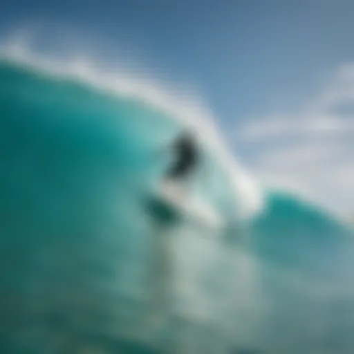 Surfer riding the turquoise wave in Turks and Caicos