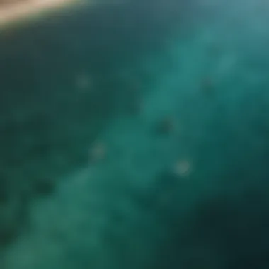 Aerial view of kitesurfers in action on the crystal-clear waters of Greece