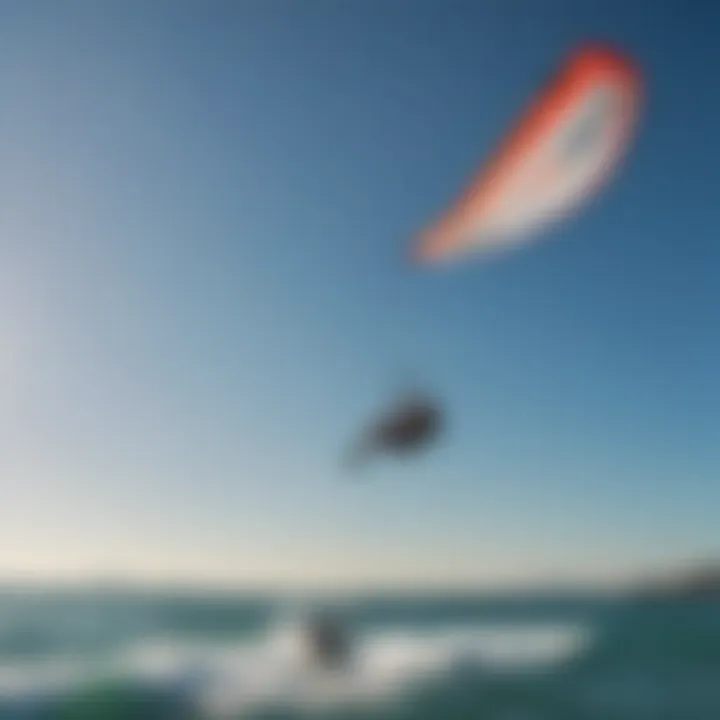 Kitesurfers performing impressive tricks under a clear blue sky in Greece