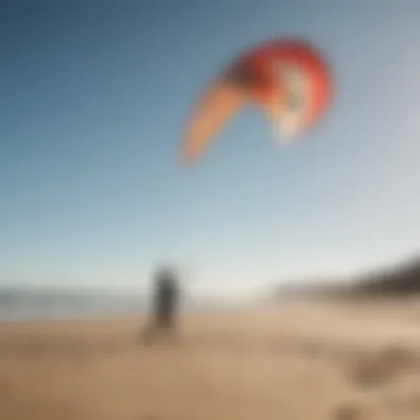 A serene beach setting with a trainer kite being controlled on the sand