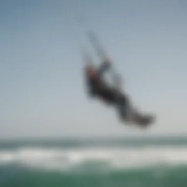 Close-up of kiteboarder executing a perfect backroll maneuver