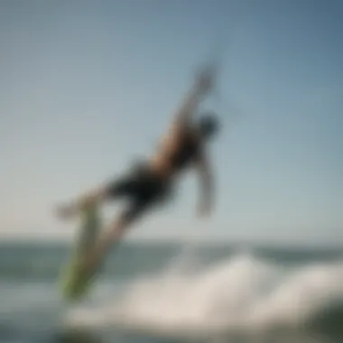 Kitesurfer performing stylish backroll trick