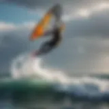 Professional kitesurfer in cold weather wetsuit against dramatic ocean backdrop