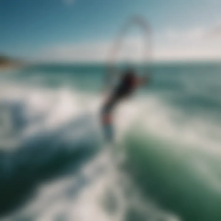 Aerial view of kitesurfer riding the waves