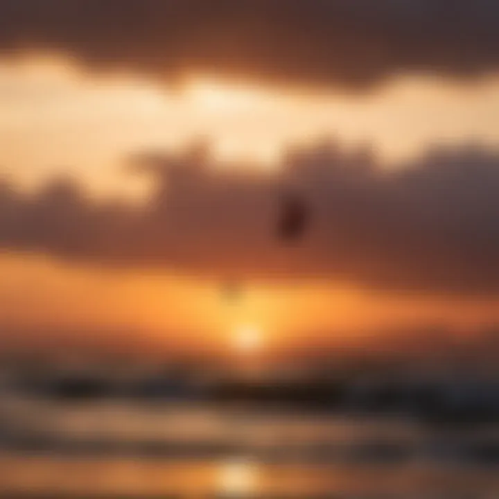 Silhouette of kitesurfers against a stunning sunset backdrop