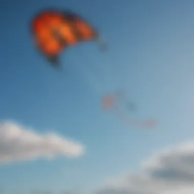 A close-up view of a force kite in action, showcasing its aerodynamic design against a clear blue sky.