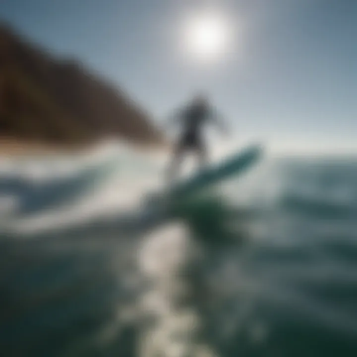 A hydrofoil surfboard gliding effortlessly over the water's surface.