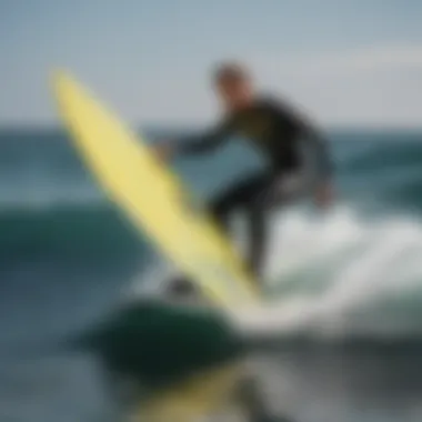 A rider expertly maneuvering a hydrofoiling surfboard.