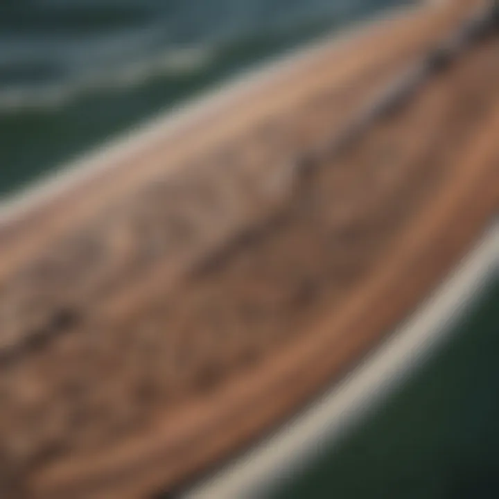 Close-up of a kiteboard with intricate designs, showcasing the artistry involved in the sport.