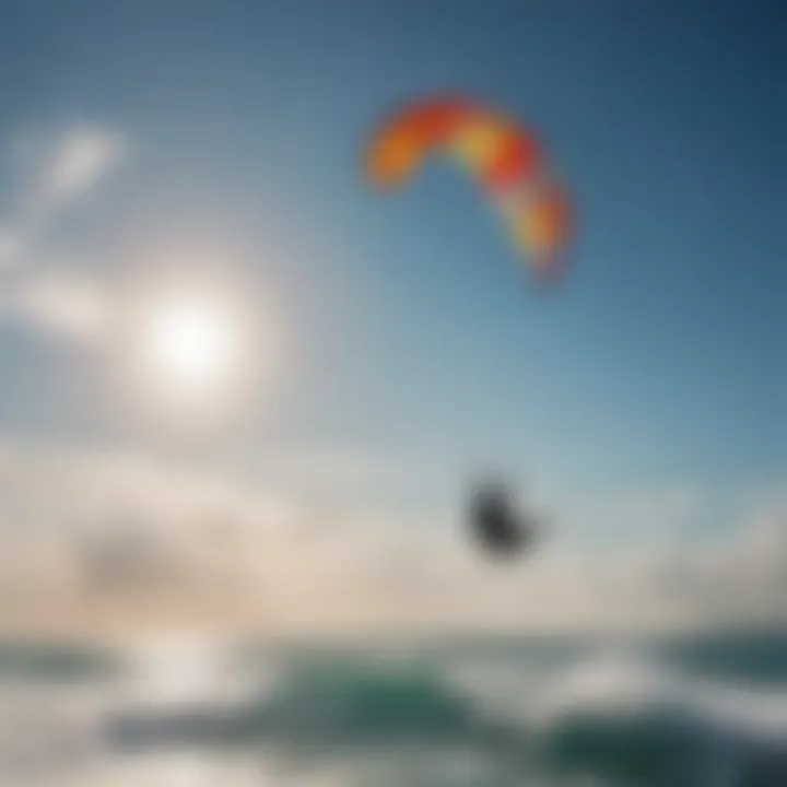 A vibrant kite soaring against a clear blue sky, symbolizing the freedom of kitesurfing.