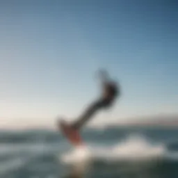 A kitesurfer gliding effortlessly over the water, showcasing the balance of forces in kitesurfing.