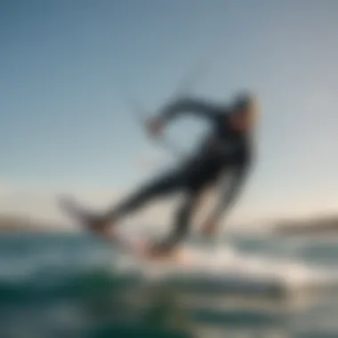 An action shot of a kitesurfer using a Naish foil board, demonstrating its performance on the water.