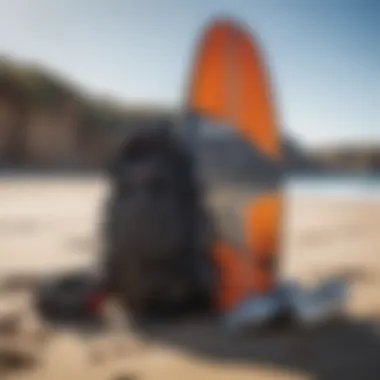 Kitesurfing gear laid out on the beach