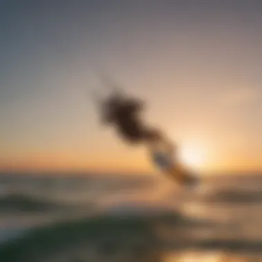 Kiteboarder catching air during sunset session