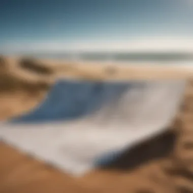 Kitesurfing and kiteboarding equipment against a backdrop of a dynamic wind map