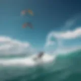 Aerial view of turquoise waters and kitesurfers in action