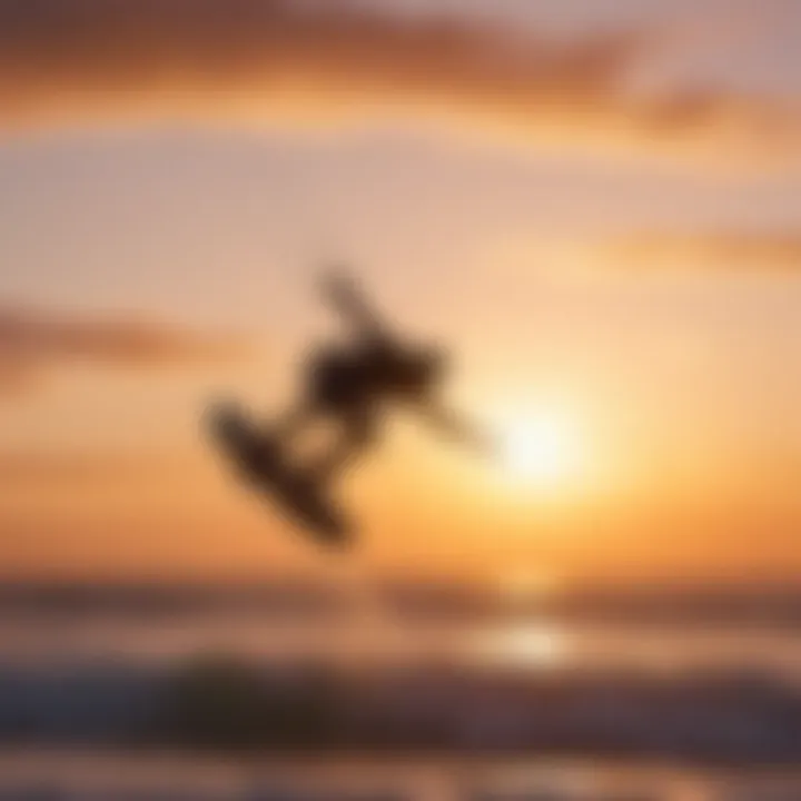 Silhouette of kitesurfer in mid-air jump against vibrant sunset sky