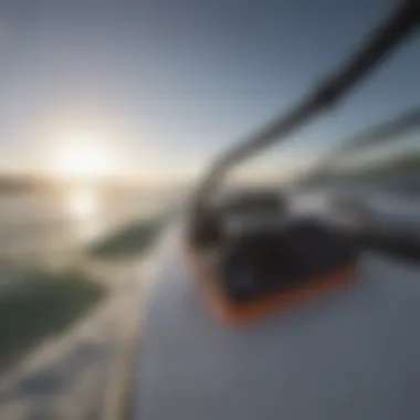 Close-up of wakeboarding gear including bindings and rope handle on a boat