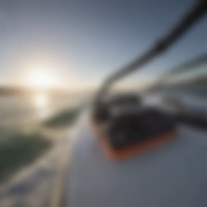 Close-up of wakeboarding gear including bindings and rope handle on a boat