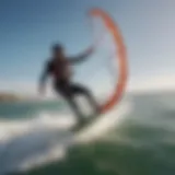 Dynamic kitesurfing maneuver showcasing wind barriers